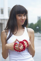 Image showing Woman with beads