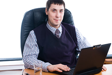 Image showing Portrait of a young businessman with laptop