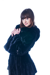 Image showing Young woman in fur coat