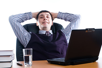 Image showing Portrait of a young businessman with laptop