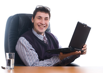 Image showing Portrait of a young businessman with laptop