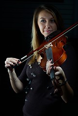 Image showing Woman and violin