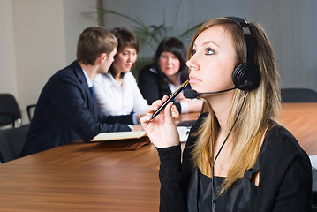 Image showing Beautiful business woman with headset