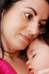 Image showing Woman with sleeping baby 