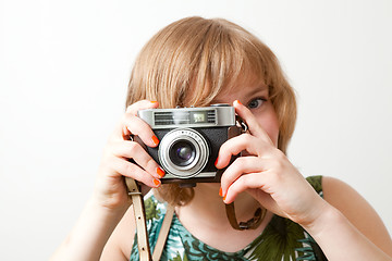 Image showing Woman with a vintage camera