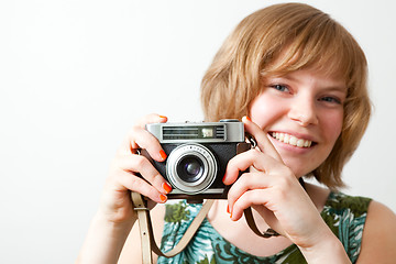 Image showing Woman with a vintage camera