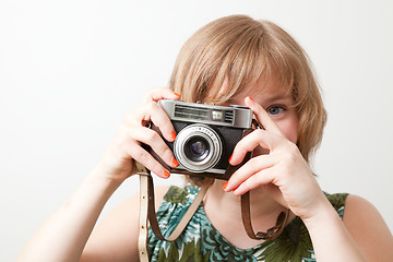 Image showing Woman with a vintage camera