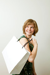 Image showing Young woman with shopping bag