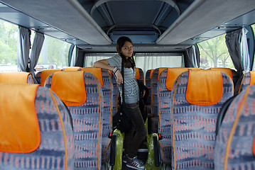 Image showing Teenage girl tourist in bus