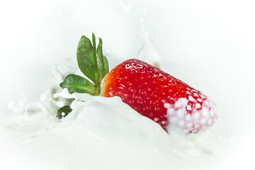 Image showing strawberry splashing into milk