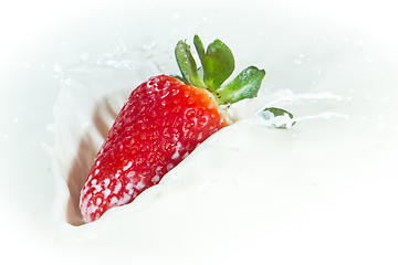 Image showing strawberry splashing into milk