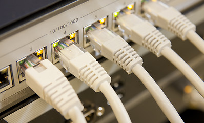 Image showing network cables connected to switch
