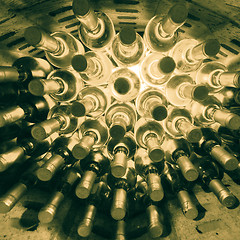 Image showing wine bottles stacked up