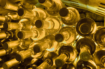 Image showing wine bottles stacked up