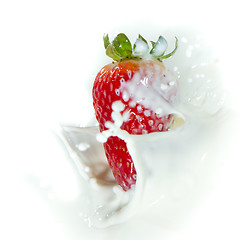 Image showing strawberry splashing into milk