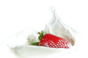 Image showing strawberry splashing into milk