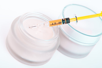 Image showing botox cream with syringe