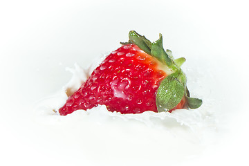 Image showing strawberry splashing into milk