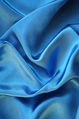 Image showing Smooth elegant blue silk as background 