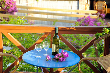 Image showing wine and flowers