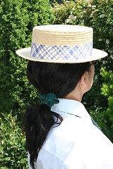 Image showing Girl with hat and pony-tail