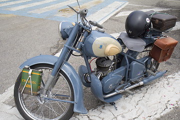 Image showing Vintage motorcycle parked.