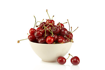 Image showing Sweet red cherries in ceramic bowl