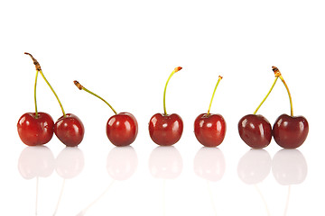 Image showing Sweet red cherries isolated on white background