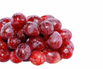 Image showing Perfect bunch of red grapes isolated on white background 