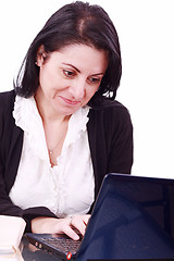 Image showing Beautiful businesswoman working on laptop in the office 