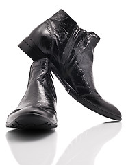 Image showing Pair of leather mens boots on white 