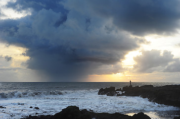 Image showing Fisherman at sunset