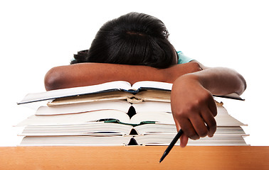 Image showing Tired of homework studying