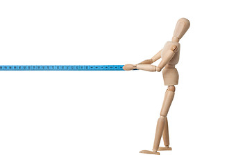 Image showing Mannequin pulling a measuring tape