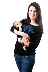 Image showing Happy Mom Holding Her Newborn Baby