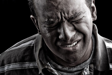 Image showing Man In Extreme Anguish or Pain