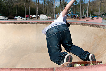 Image showing Skateboarder Skating the Bowl