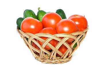 Image showing Basket with tomatoes and cucumbers