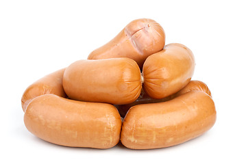 Image showing Pile of sausages isolated on the white background