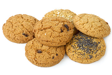 Image showing Few oatmeal cookies (with raisins, sesame and poppy seeds) isolated on the white background