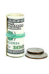 Image showing Roll of $100 banknotes tightened with rubber band and two coins