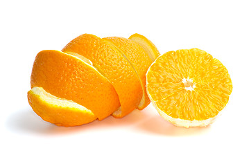 Image showing Half of an orange and some peel