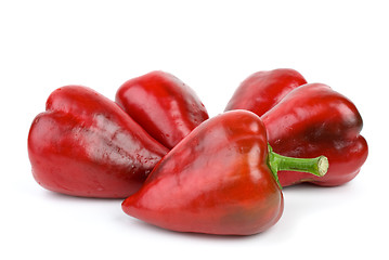 Image showing Five red sweet peppers