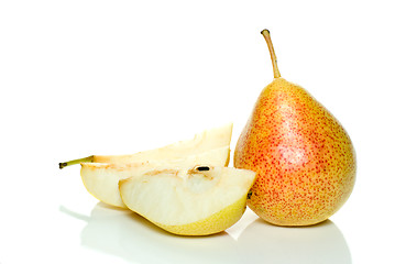 Image showing Whole yellow-red pear and few slices