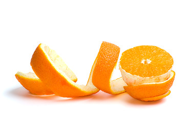 Image showing Half of an orange and some peel