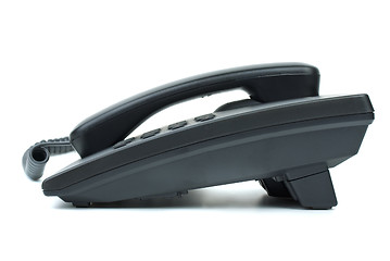 Image showing Black office phone. Side view