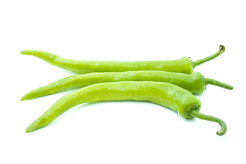 Image showing Three yellow-green chili peppers