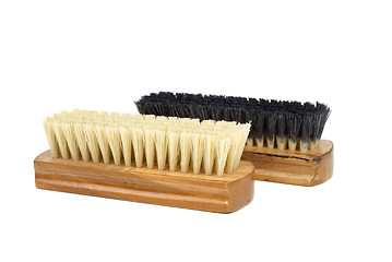 Image showing Dirty (black) and new (white) clothes (or shoe) brushes