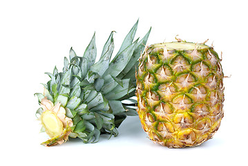 Image showing Pineapple and sliced-out leaves