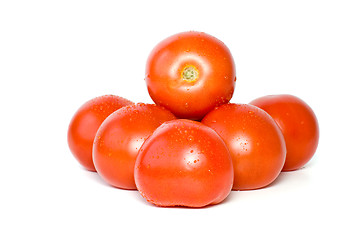 Image showing Pile of tomatoes with waterdrops 